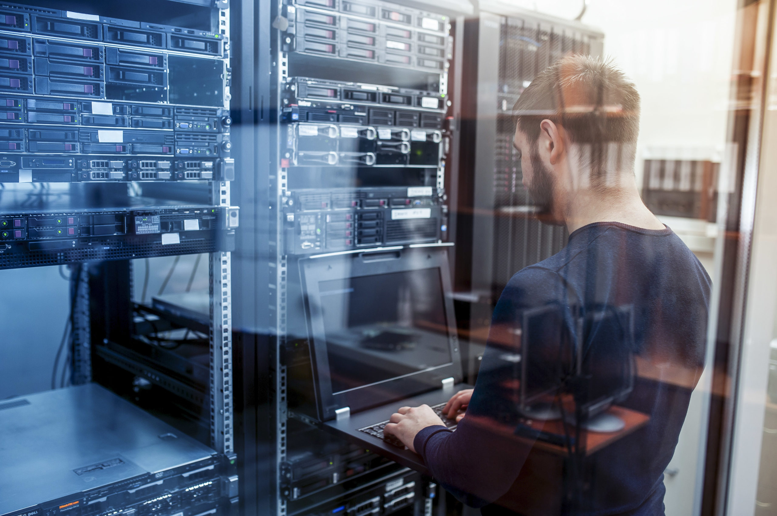 network engineer working in server room